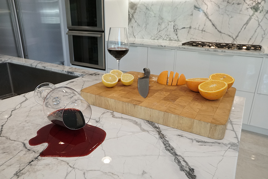 Wine spilled on a counter with marble protection near Toronto